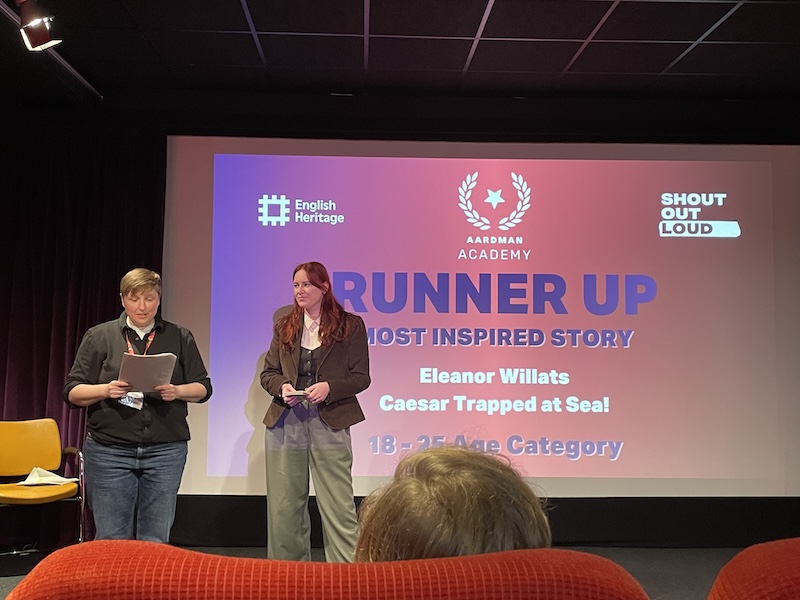 Elly Willats receiving her award at the Animated Histories Film Festival
